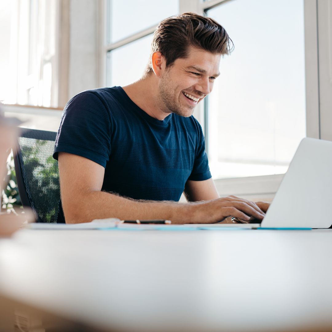 man looking at computer